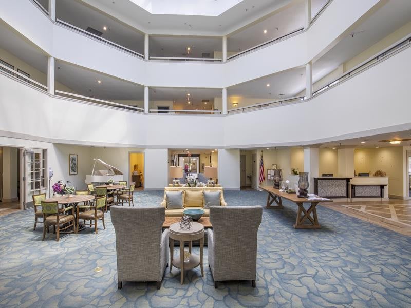 A modern lobby with comfortable seating and an open atrium design.