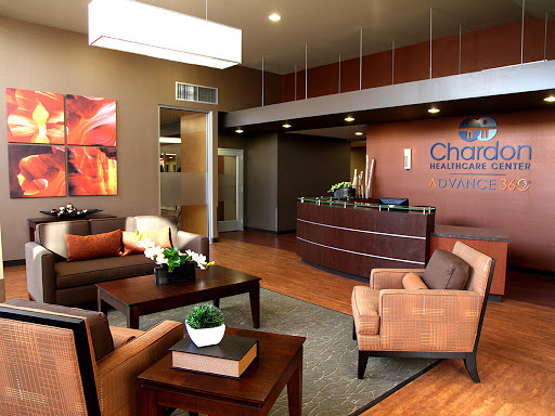 A stylish and inviting reception area featuring modern furniture and contemporary artwork.