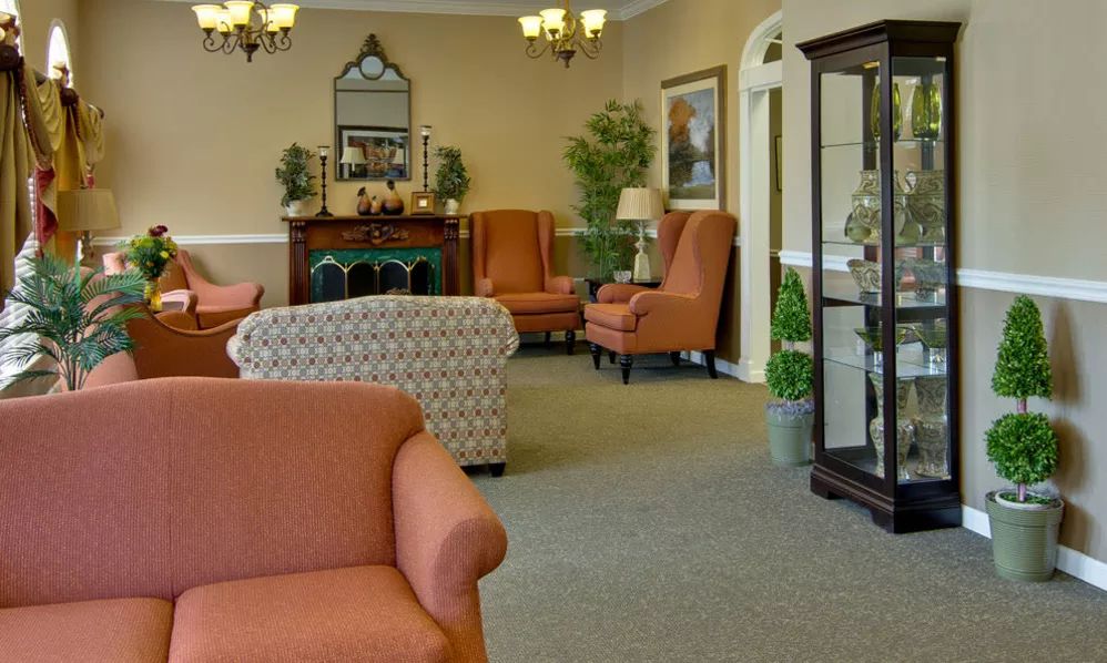 A cozy living room with comfortable seating and elegant decor.