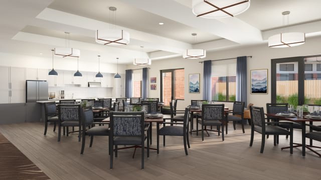 A modern dining room with elegant furnishings and ample natural light.