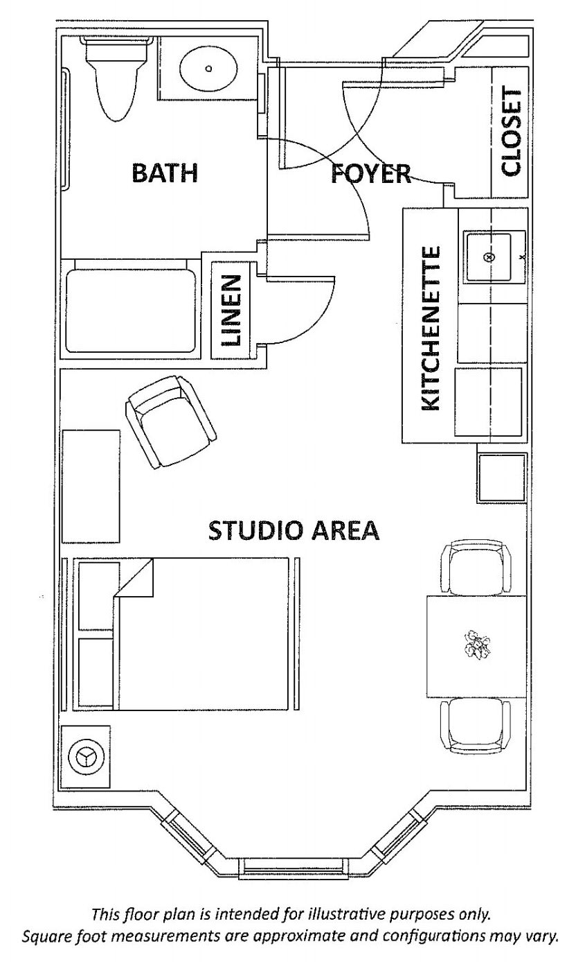 Floor plan of a studio apartment featuring a kitchenette, bed, and sitting area.