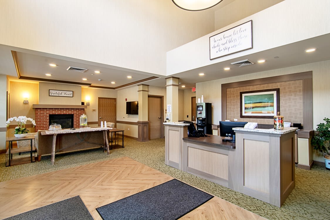 A spacious reception area with a modern design and comfortable seating.