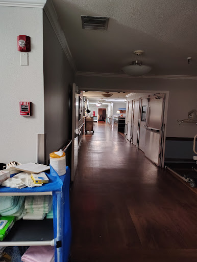 A view of a hospital hallway, highlighting the clean and organized environment typical in healthcare facilities.