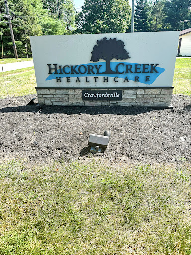 The entrance sign for Hickory Creek Healthcare in Crawfordsville.