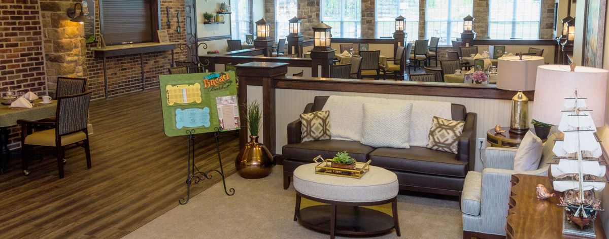 A cozy office lobby with comfortable seating and stylish decor.