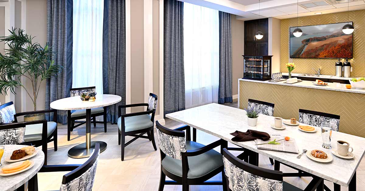 A modern dining area with sleek furniture and stylish decor.