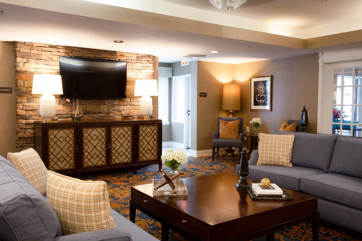 A modern living room with comfortable seating and stylish decor.