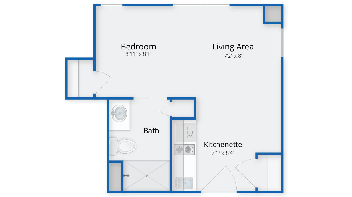 A simple one-bedroom apartment floor plan with a living area, kitchenette, and bathroom.