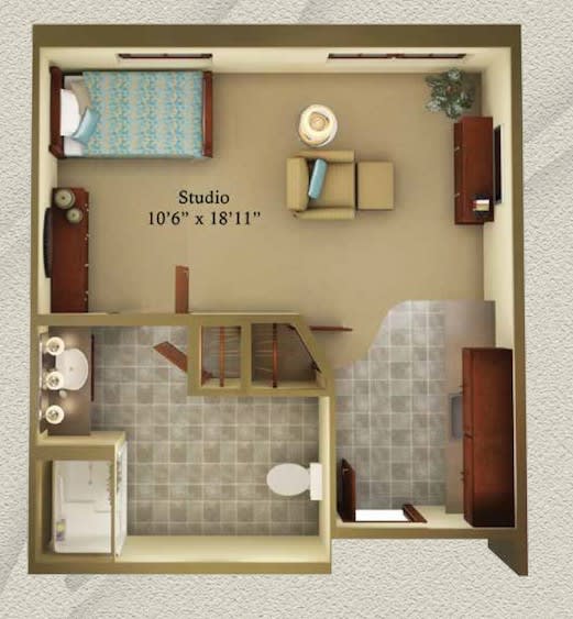 A studio apartment floor plan showing the arrangement of furniture and layout of the room.