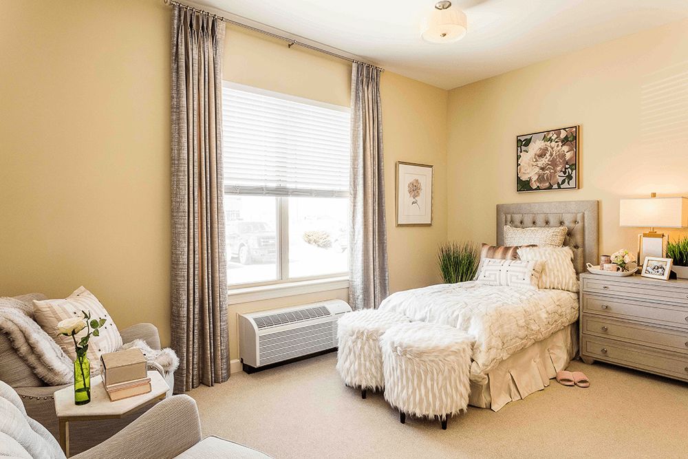 A cozy, modern bedroom with elegant decor and natural lighting.