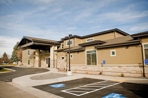 A modern facility featuring accessible parking spots.