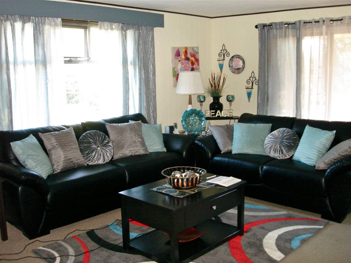 A modern living room with comfortable seating and stylish decor.