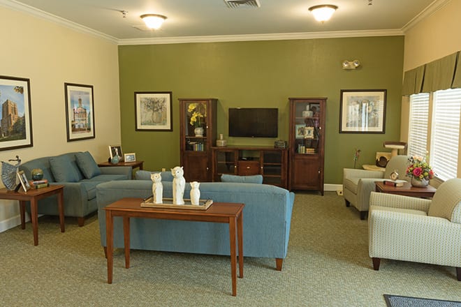 A cozy living room with comfortable seating and tasteful decor.