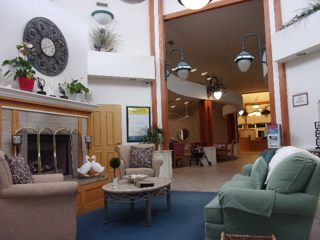 A modern living room with comfortable seating and stylish decor.