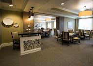 A cozy dining area with elegant decor and comfortable seating.