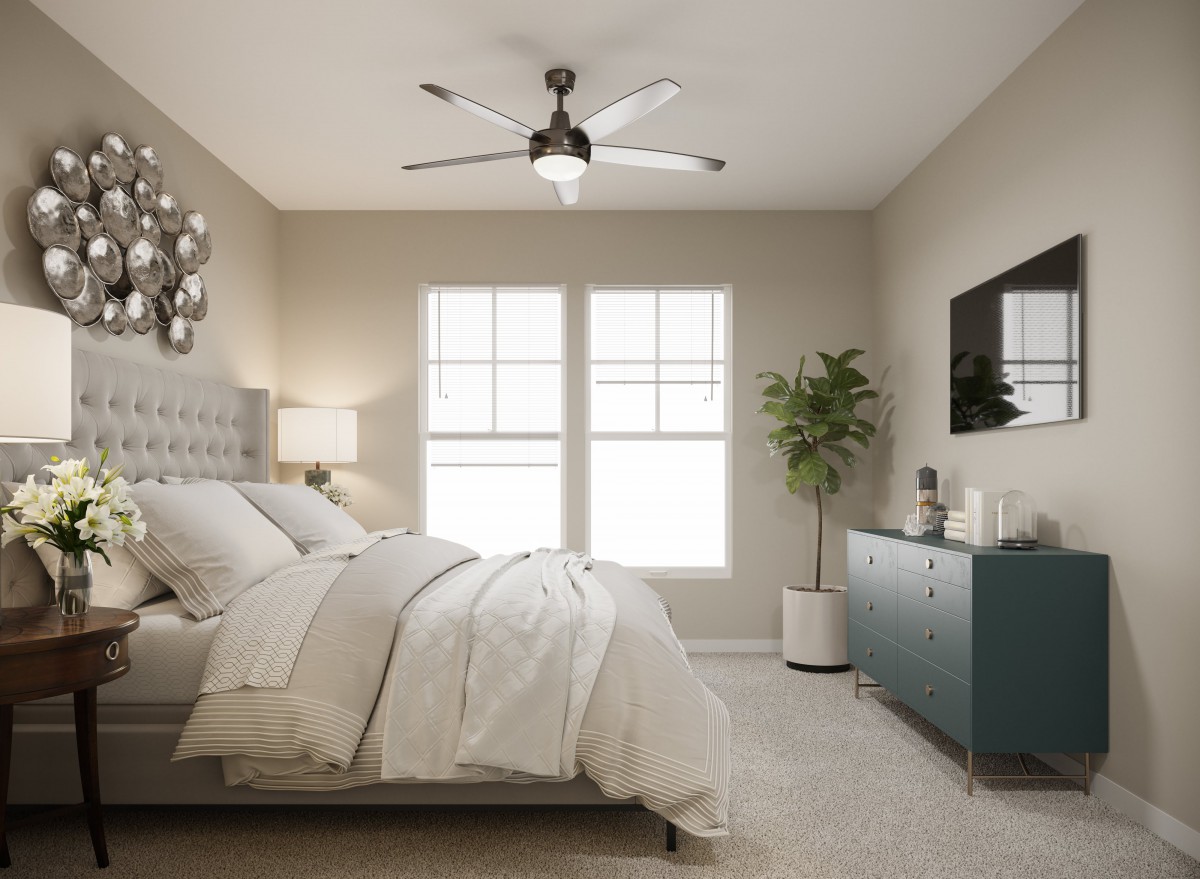 A modern and cozy bedroom featuring neutral tones, a plush bed, a stylish dresser with a mirror, and a ceiling fan.