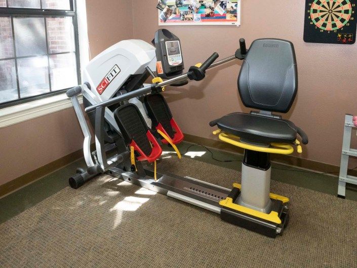 A leg press machine set up in a gym for exercise and fitness.