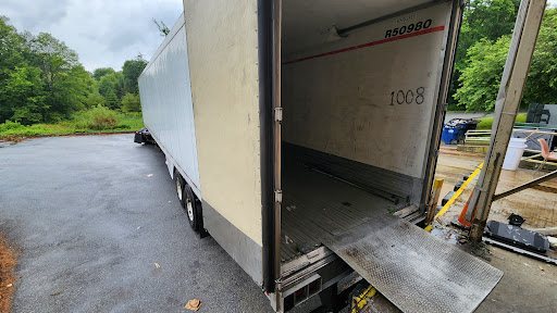 An empty truck trailer ready for loading.