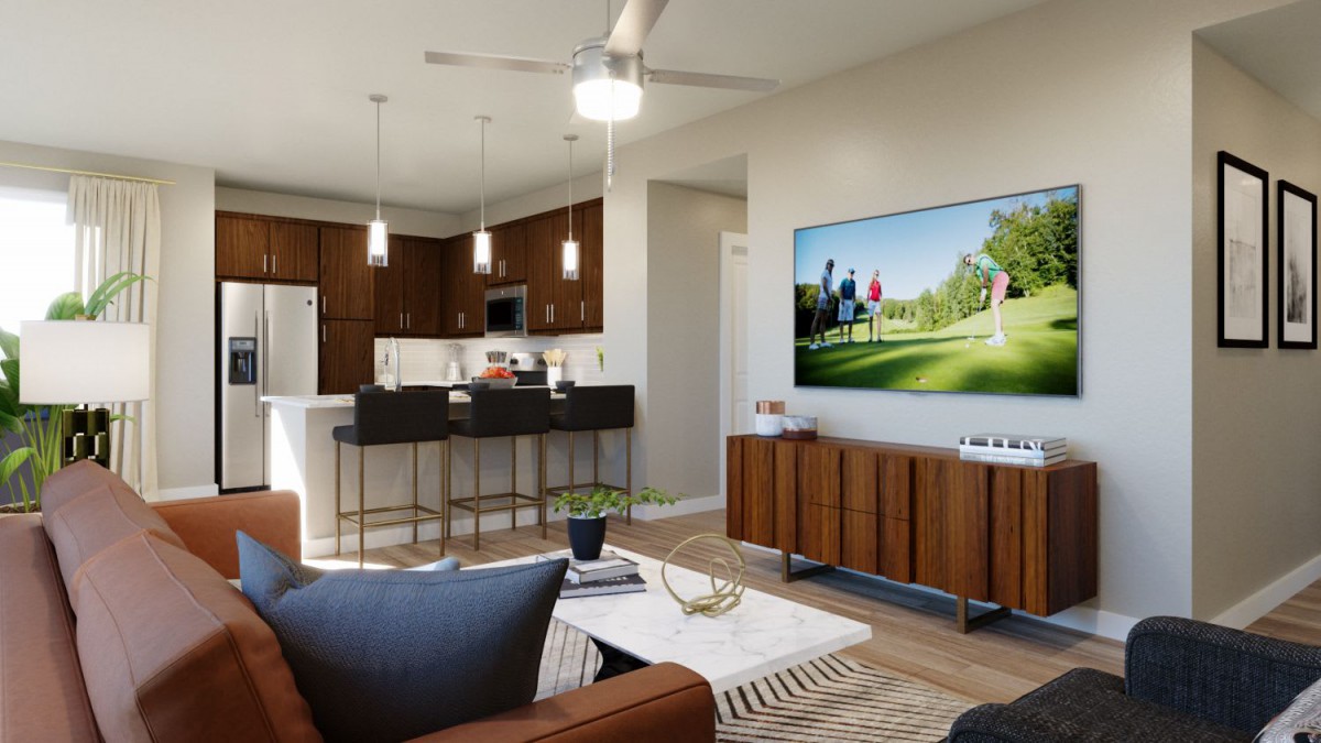 Modern open-plan living room and kitchen with a cozy ambiance.