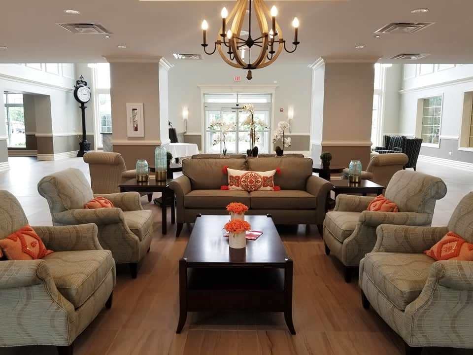 A cozy living room with comfortable seating and elegant decor.