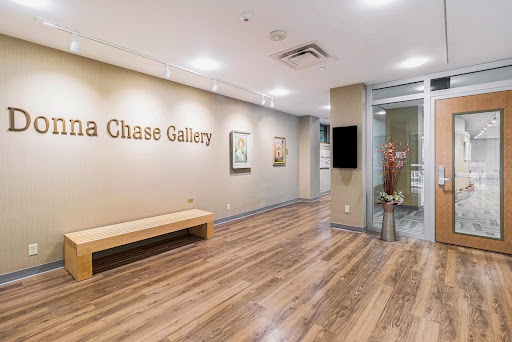 A view of the lobby area in the Chase Gallery, featuring modern decor and artworks.
