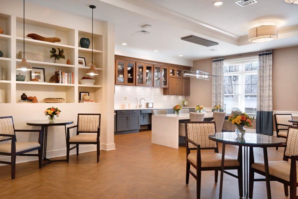 A modern kitchen interior with stylish decor and a central island counter.