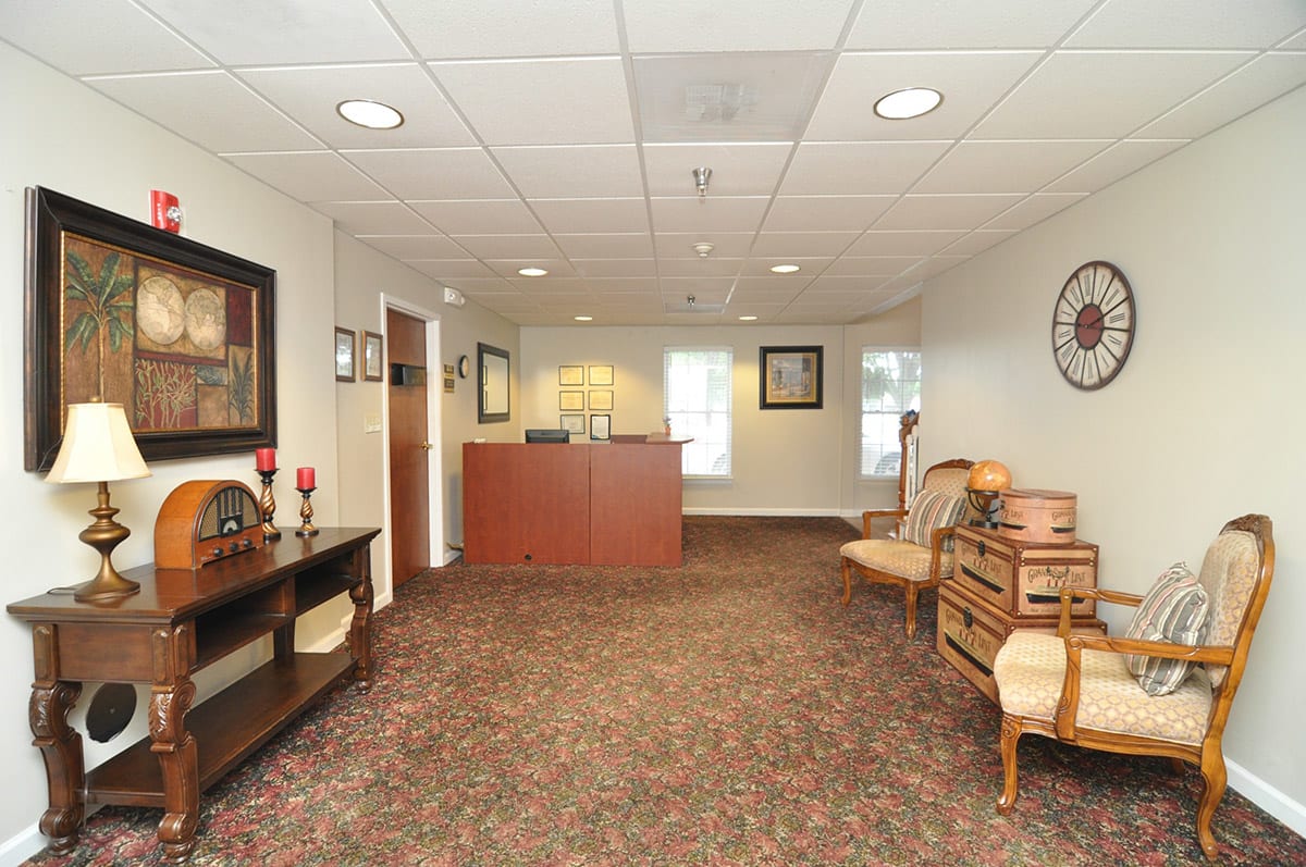 A welcoming office reception area with comfortable seating and stylish decor.