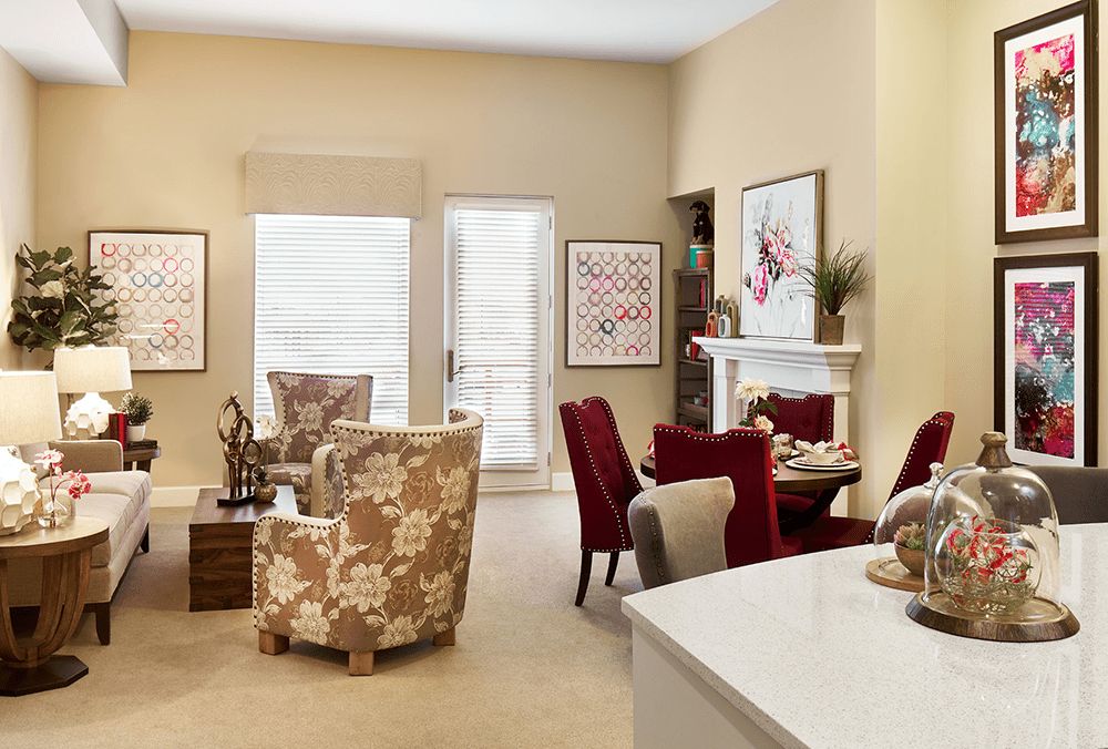 A modern living room with stylish furniture and colorful decor.