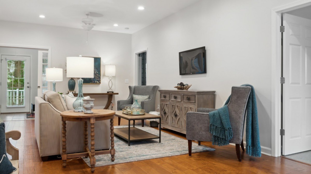 A cozy living room with elegant decor and comfortable seating.
