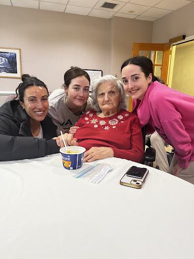 A joyful moment shared with family over ice cream.