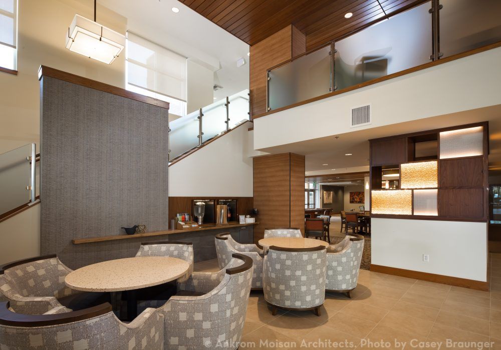 A modern, well-designed lobby with comfortable seating and stylish decor.
