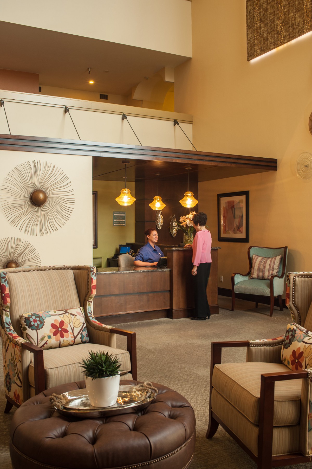 A warm and welcoming reception area with comfortable seating and elegant decor.