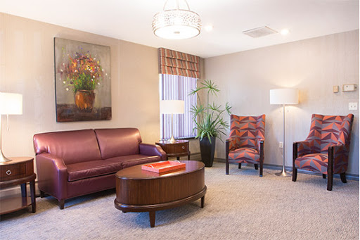 A cozy and elegantly designed living room with comfortable seating and tasteful decor.
