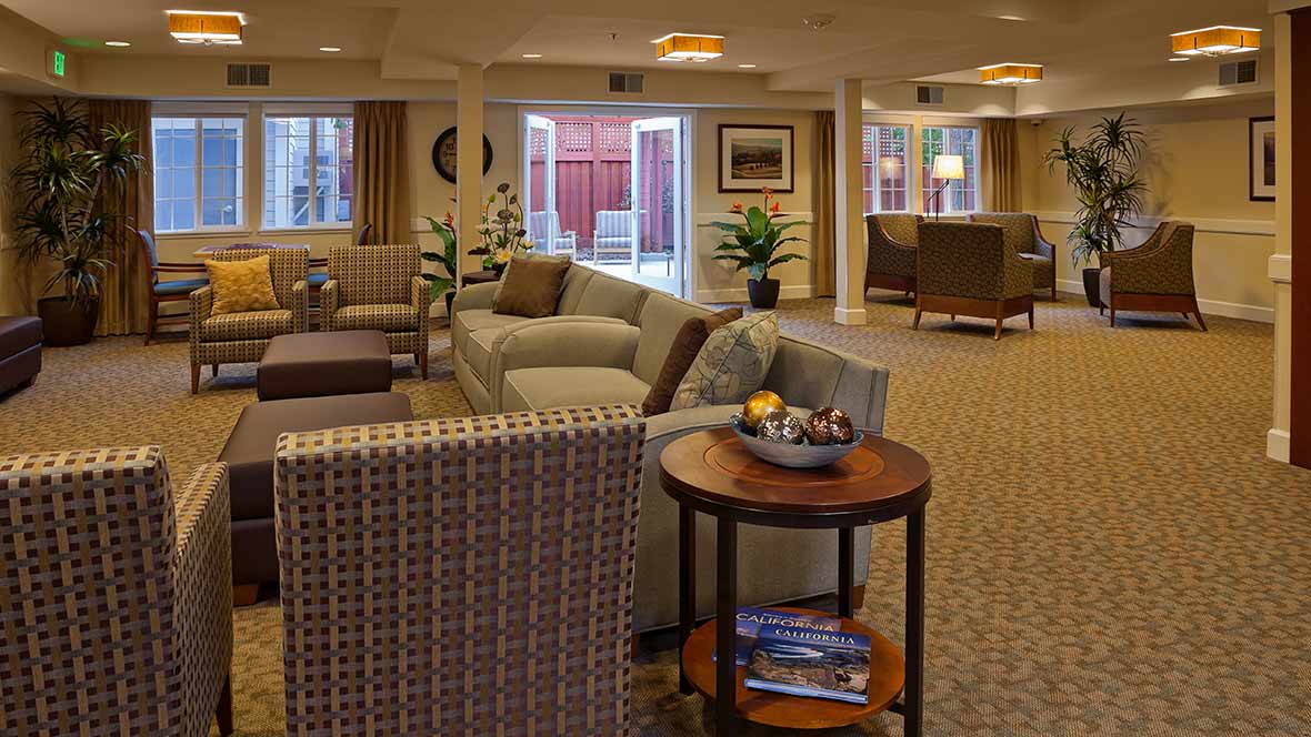 A cozy and well-decorated living room with comfortable seating and tasteful decor.