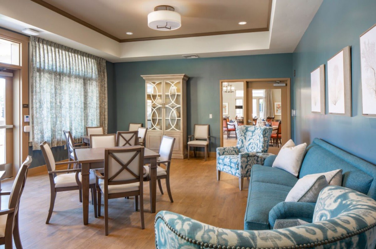 A spacious living room with elegant furniture and a stylish dining area.