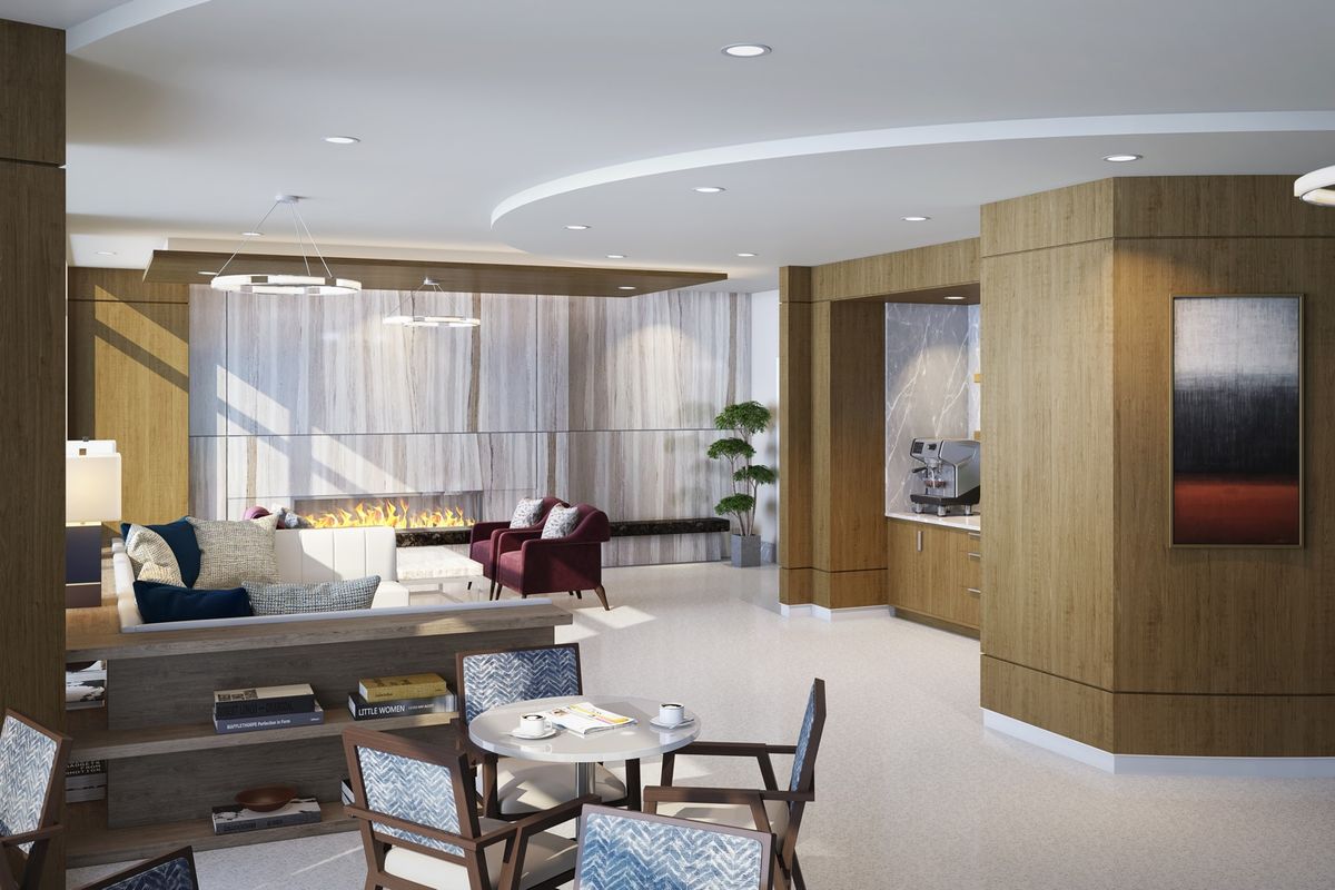 A modern and spacious living room with stylish furniture and elegant wood paneling.