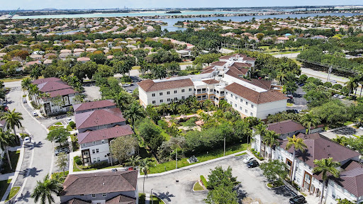 Aerial view of a residential neighborhood showcasing green spaces and modern architecture.