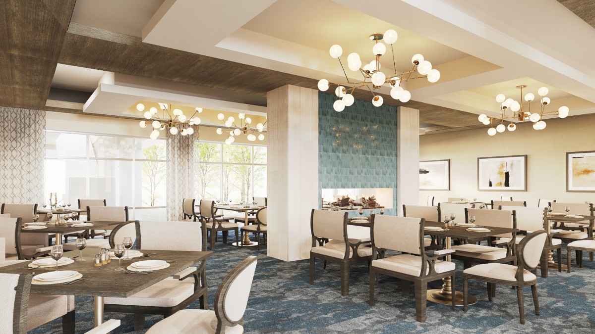 A modern and upscale restaurant dining area featuring elegant chandeliers and sophisticated interior design.