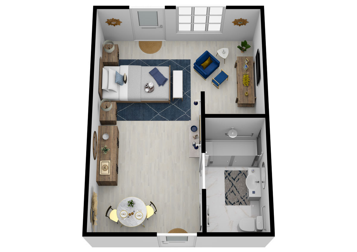 A top-down view of a studio apartment floor plan featuring a bedroom, living area, kitchen, and bathroom.