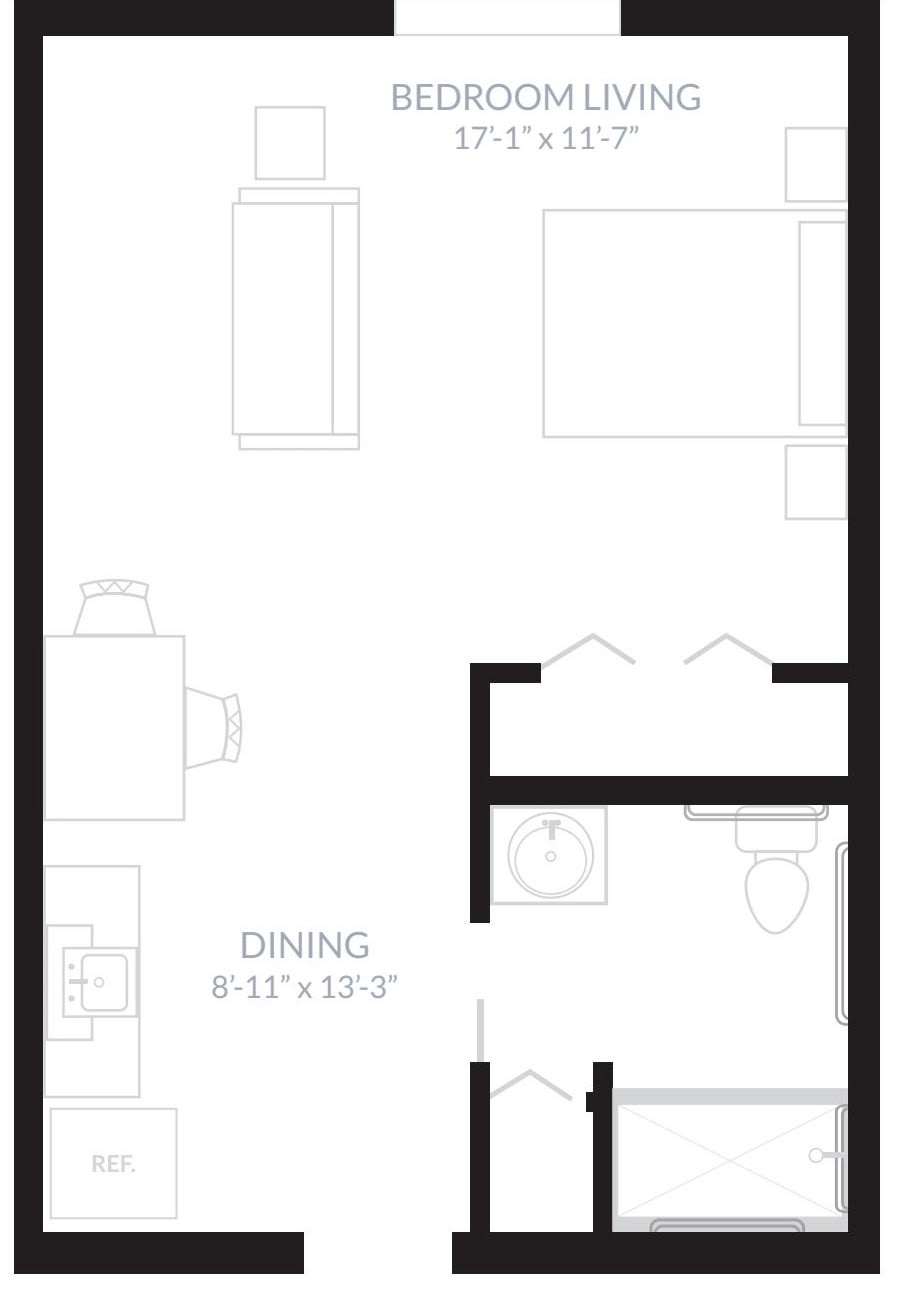 A simple floor plan showing the layout of rooms including a dining area and bathroom.