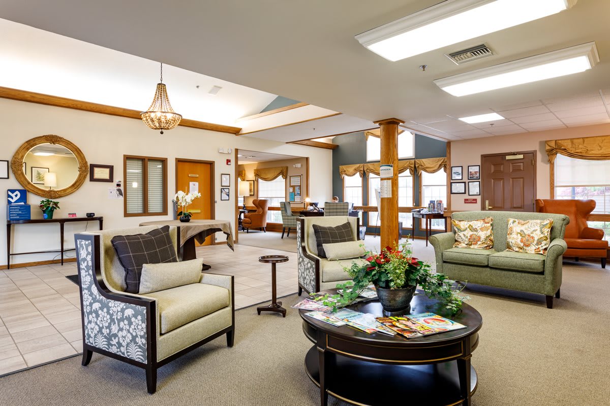 A cozy living room featuring elegant furniture and warm decor.