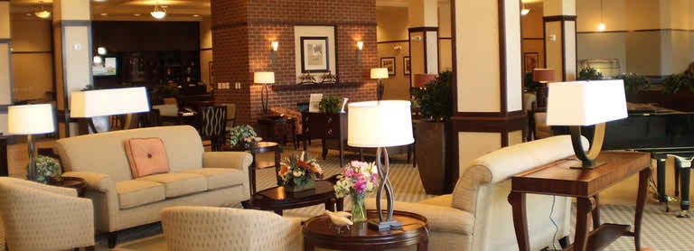 A cozy hotel lobby with comfortable seating and elegant decor.