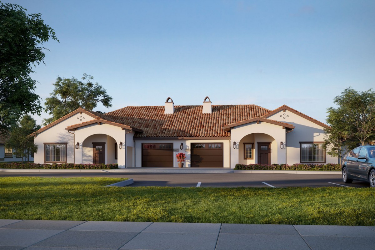 A suburban residential house with a tiled roof and landscaped front yard.
