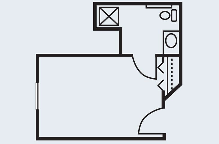 A simple floor plan depicting a room with an attached bathroom.