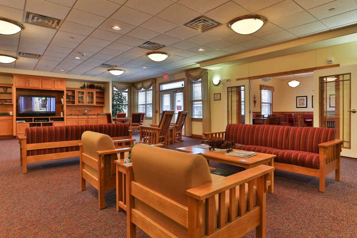 A cozy lobby area with comfortable seating and warm lighting.