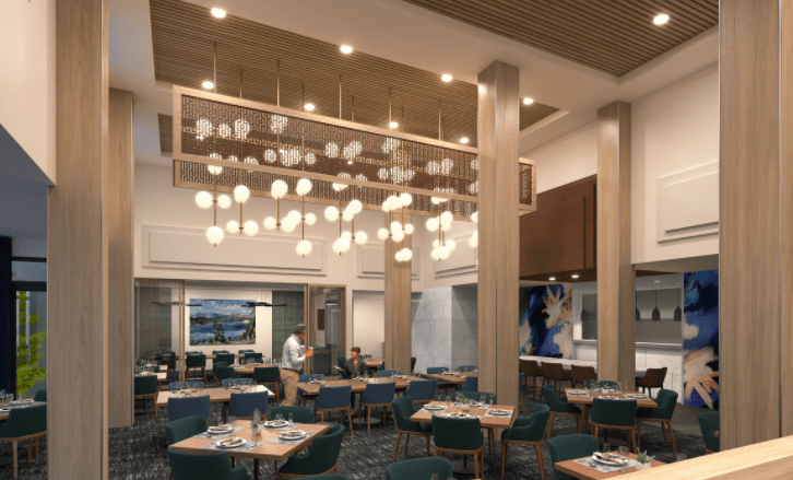 A modern restaurant interior with elegant lighting and chic seating arrangements.