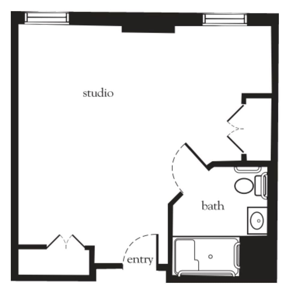 Floor plan of a studio apartment with an entryway, bathroom, and open living area.