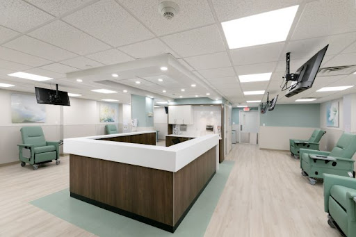 A contemporary reception area in a medical office, featuring clean lines and a welcoming atmosphere.
