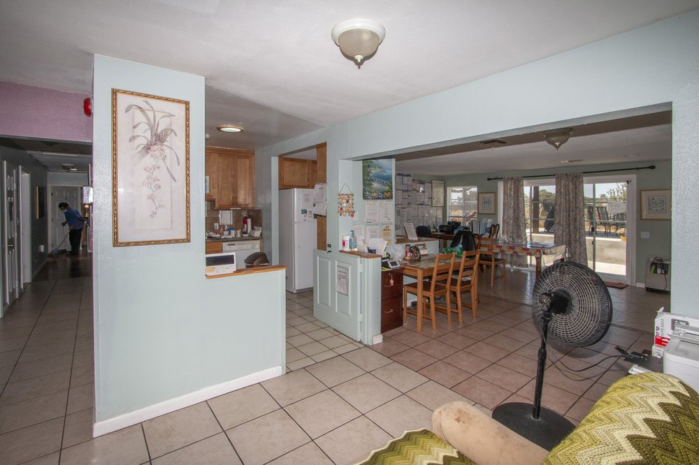 Open concept kitchen and living area with dining space.