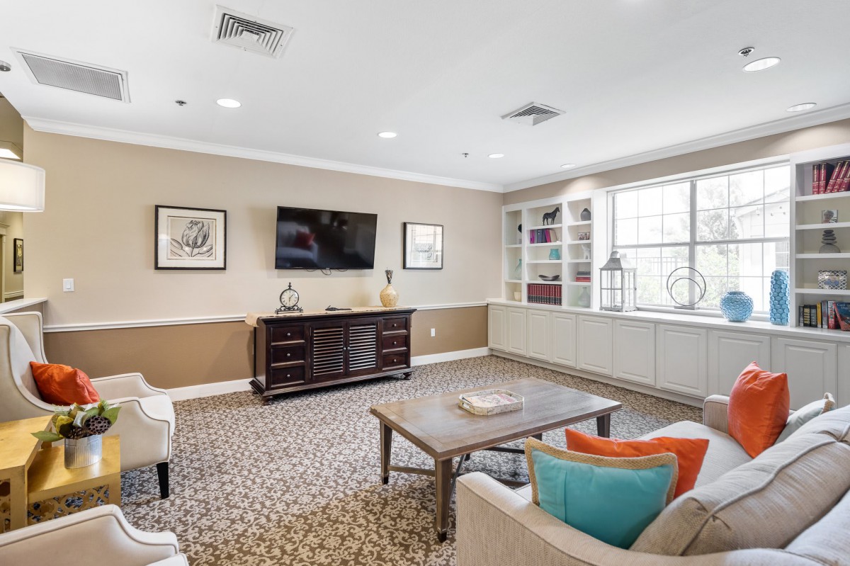 A cozy living room with comfortable seating and modern furnishings.
